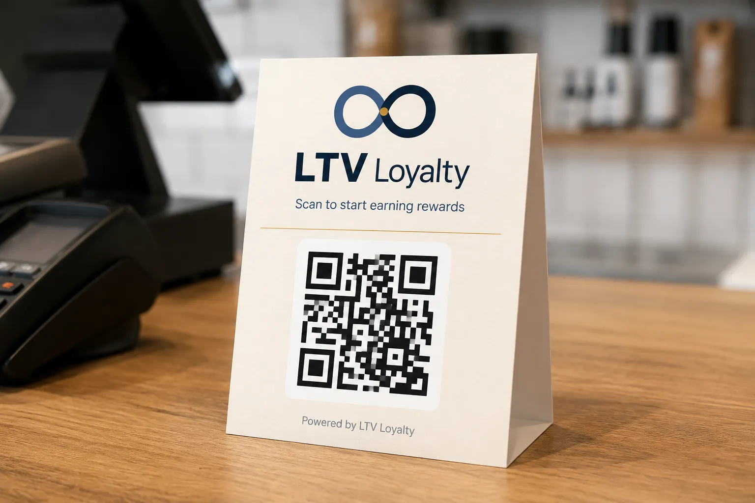 LTV Loyalty table tent with QR code on a cafe counter